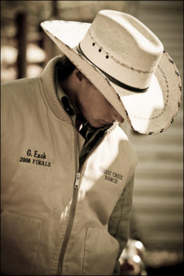 Cowboy waiting to ride behind the shoots at Helmville Rodeo