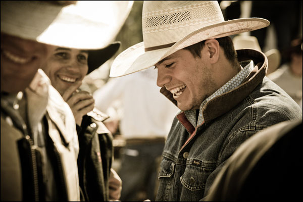 Cowboy Photography; laughing with his friends.