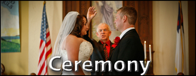 Wedding couple with minister at the alter.