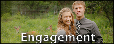 Young couple standing in forest with a couple fo deer behind them. Wedding engagement photography button