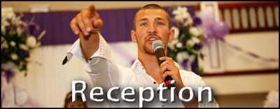 Master of Ceremony working the crowd at a wedding reception.  Wedding Reception Photography